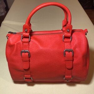 Large Red Express satchel. Inside has zipper pocket and 2 small pockets